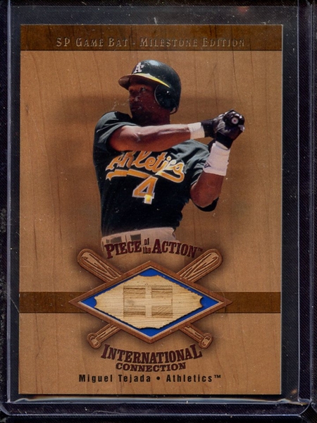 2001 SP PIECE OF ACTION MIGUEL TEJADA GAME USED BAT